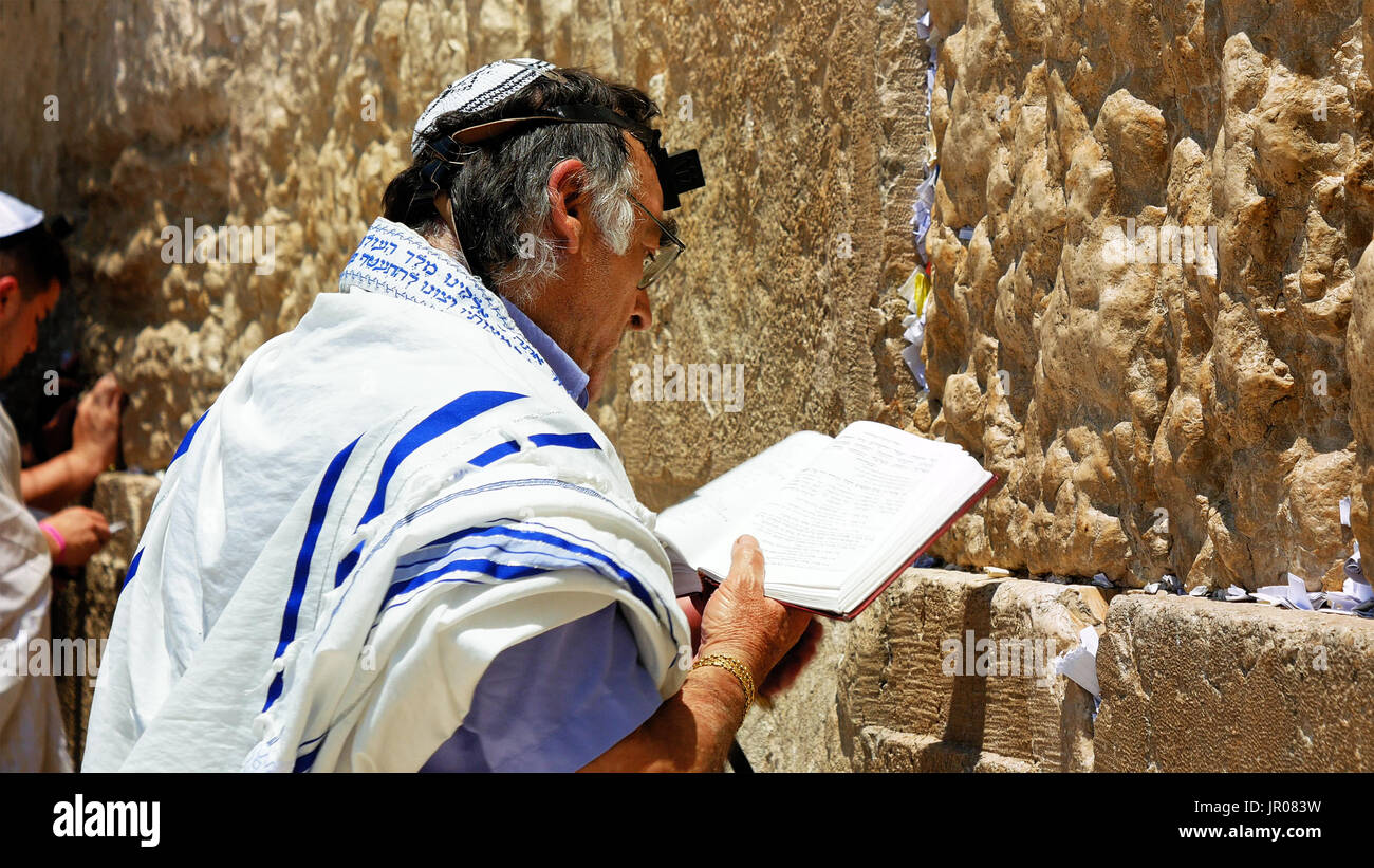 Jew pray at the Western Wall in Jerusalem Stock Photo