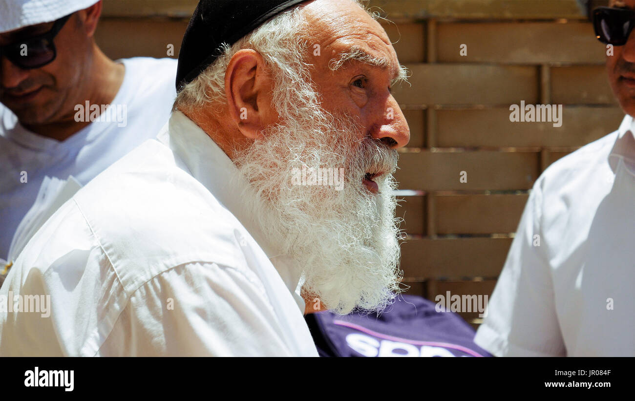 Jewish senior old man talks emotionally Stock Photo