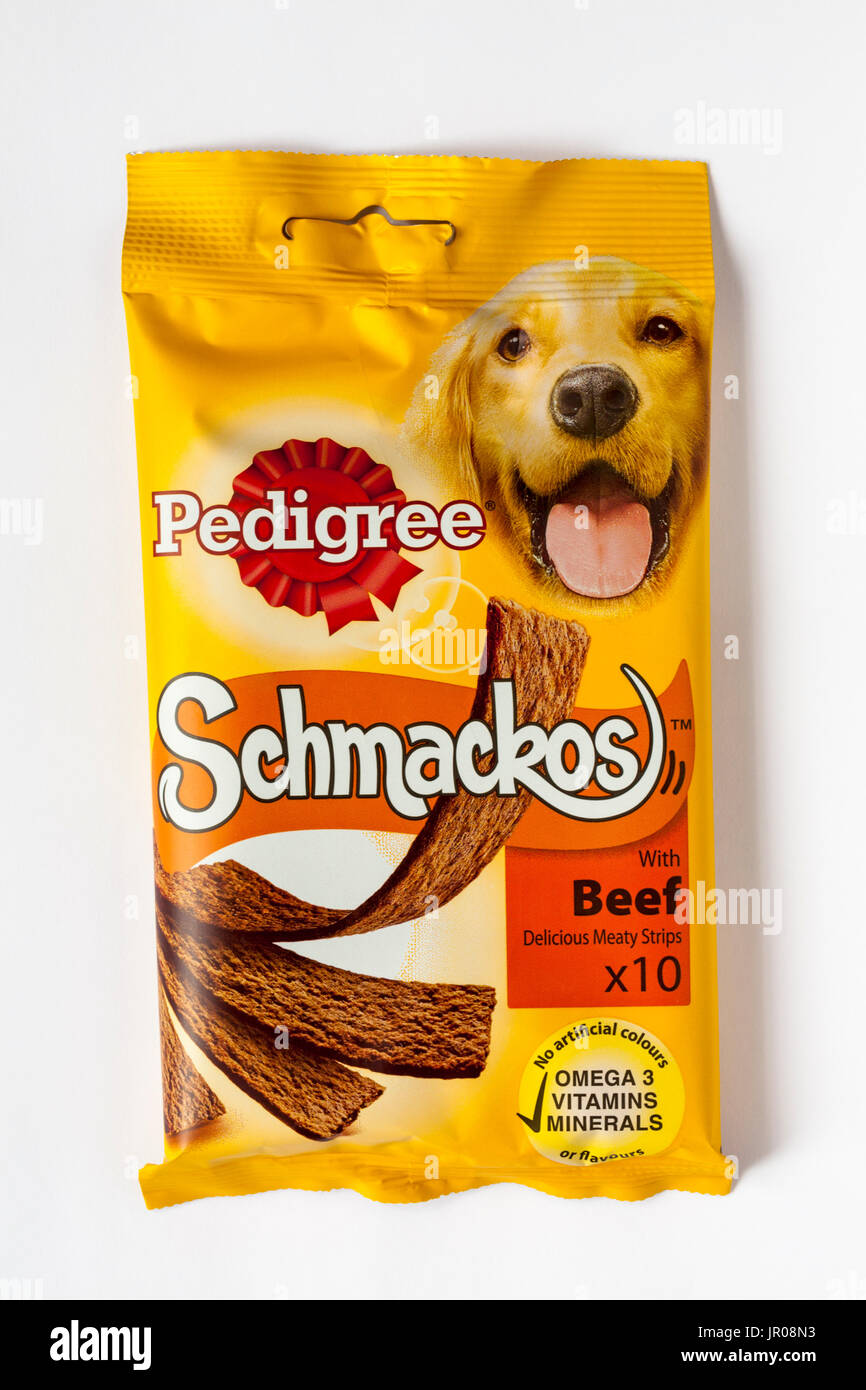 Packet of Pedigree Schmackos with beef delicious meaty strips x10 with omega 3 vitamins and minerals for dogs isolated on white background Stock Photo