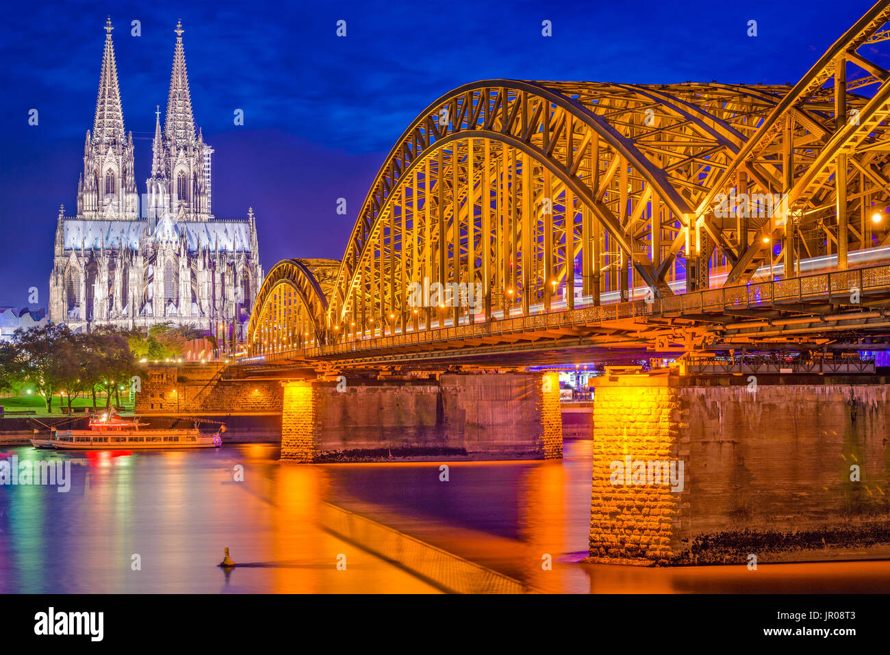 Cologne, Germany old town skyline at Cologne Cathedral and Hohenzollern Bridge. Stock Photo