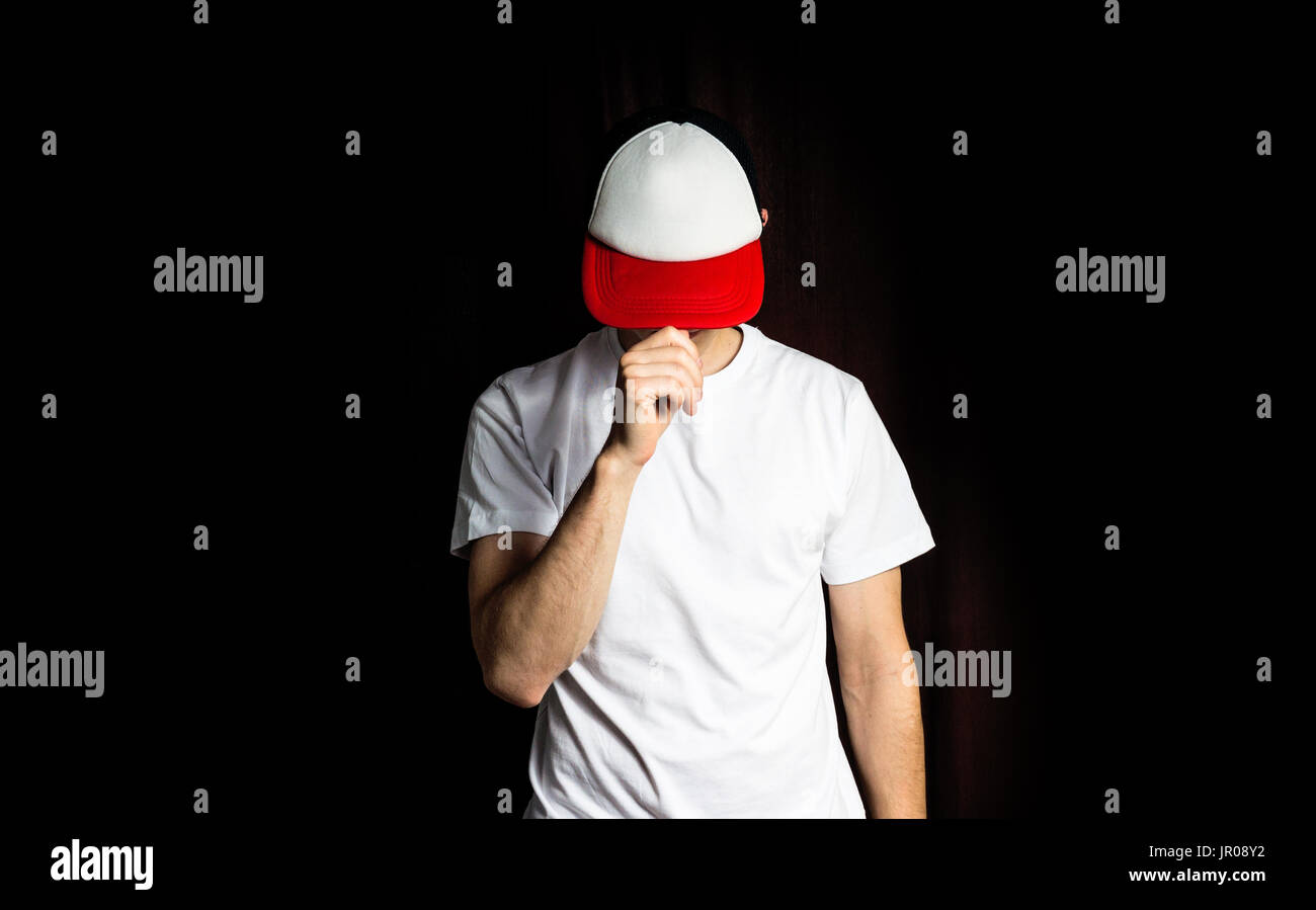 red baseball cap and white t shirt 