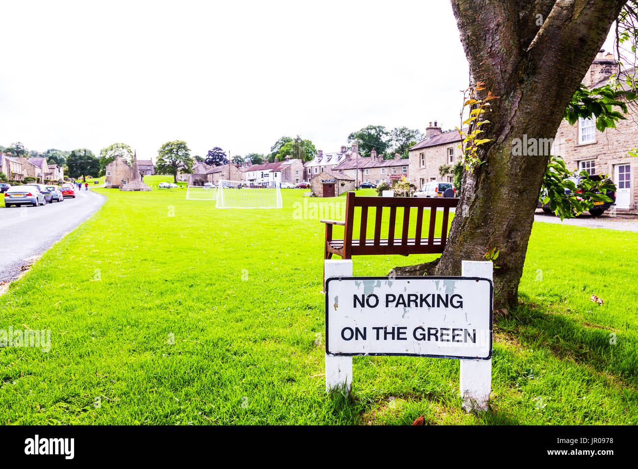 No parking on the green sign, no parking sign, West Burton, Yorkshire, UK, England, West Burton village green, West Burton village, village green, Stock Photo