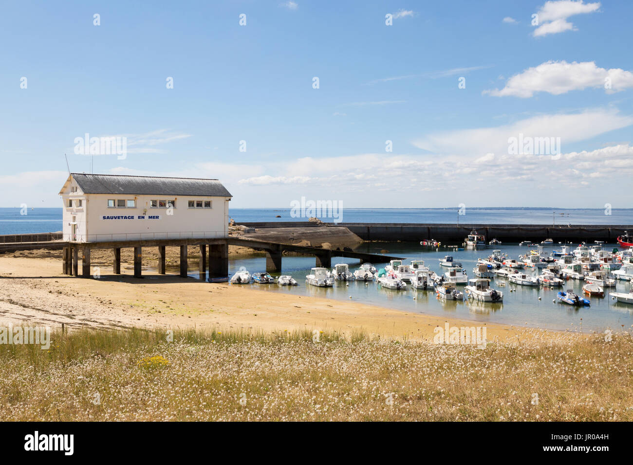 The sea rescue station ( Sauvetage en Mer ), and harbour, Trevignon, Finistere, Brittany France Stock Photo