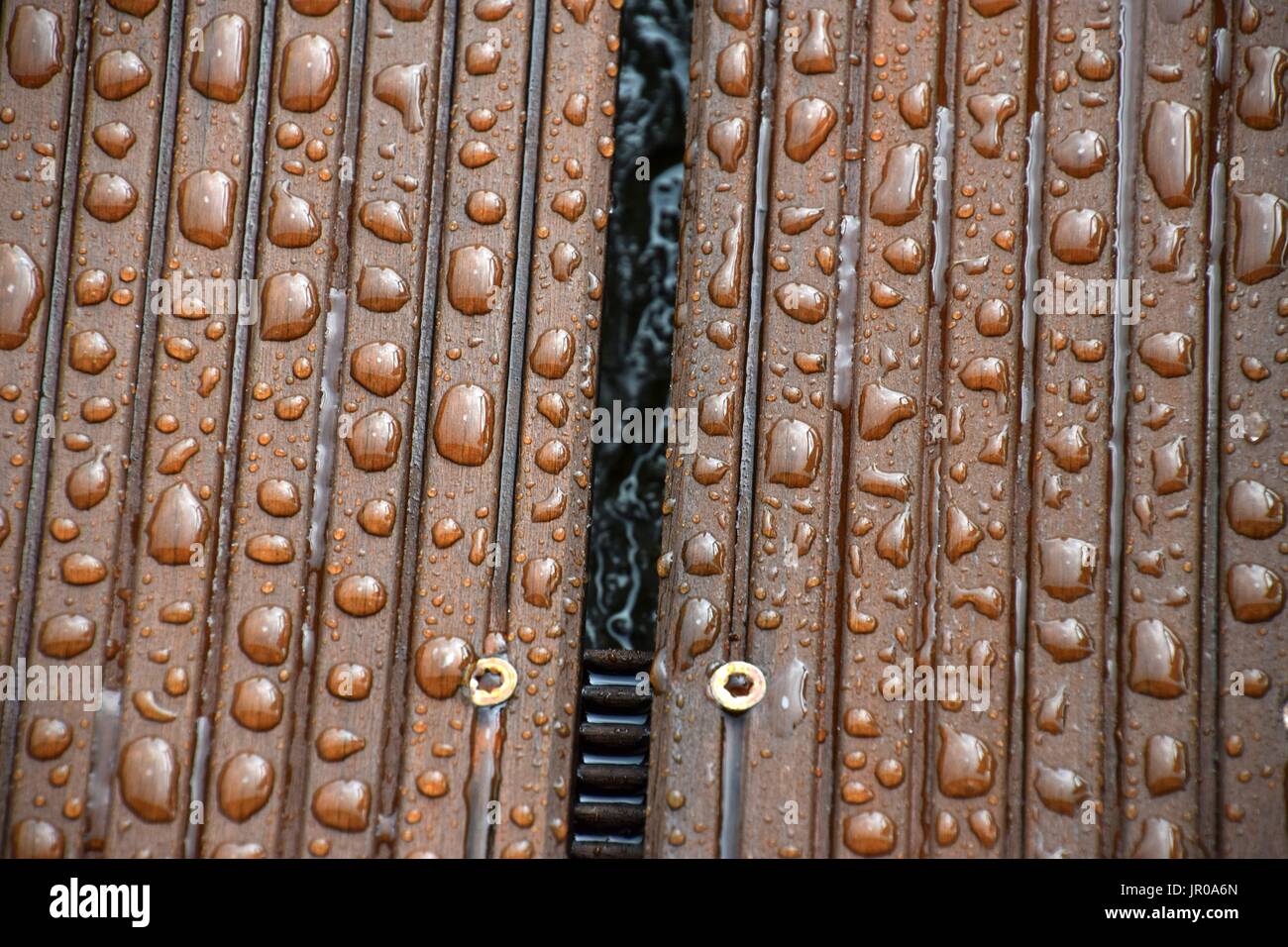 impregnated Wood with water drops Stock Photo