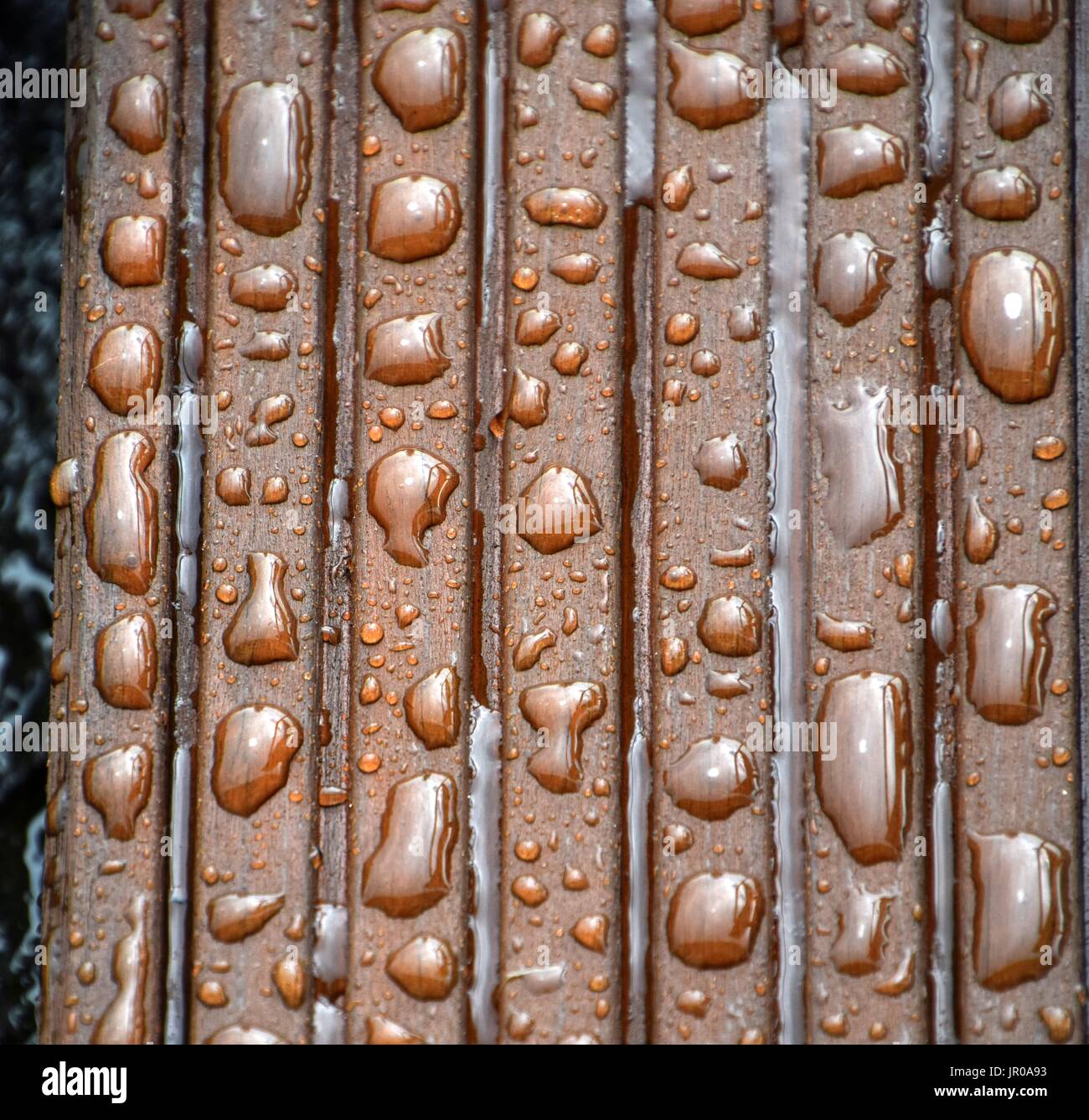 impregnated Wood with water drops Stock Photo