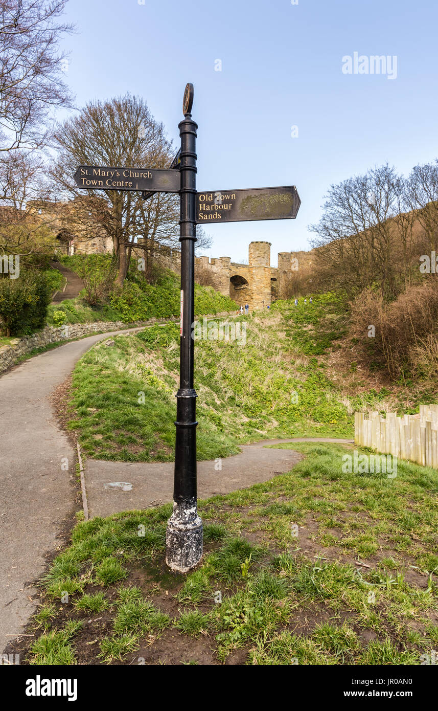 A sign to the entrance to Scarborough castle Stock Photo
