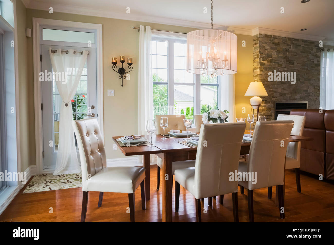 Dark Stained Oak Wood Table With White High Back Leather And Wood