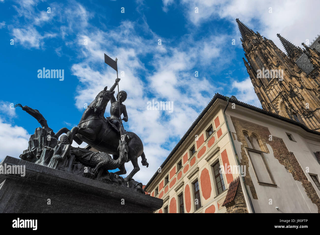 Low Angle View Of St. Vitus Cathedral, Prague Castle And A Statue Of A Rider On A Horse; Prague, Czechia Stock Photo
