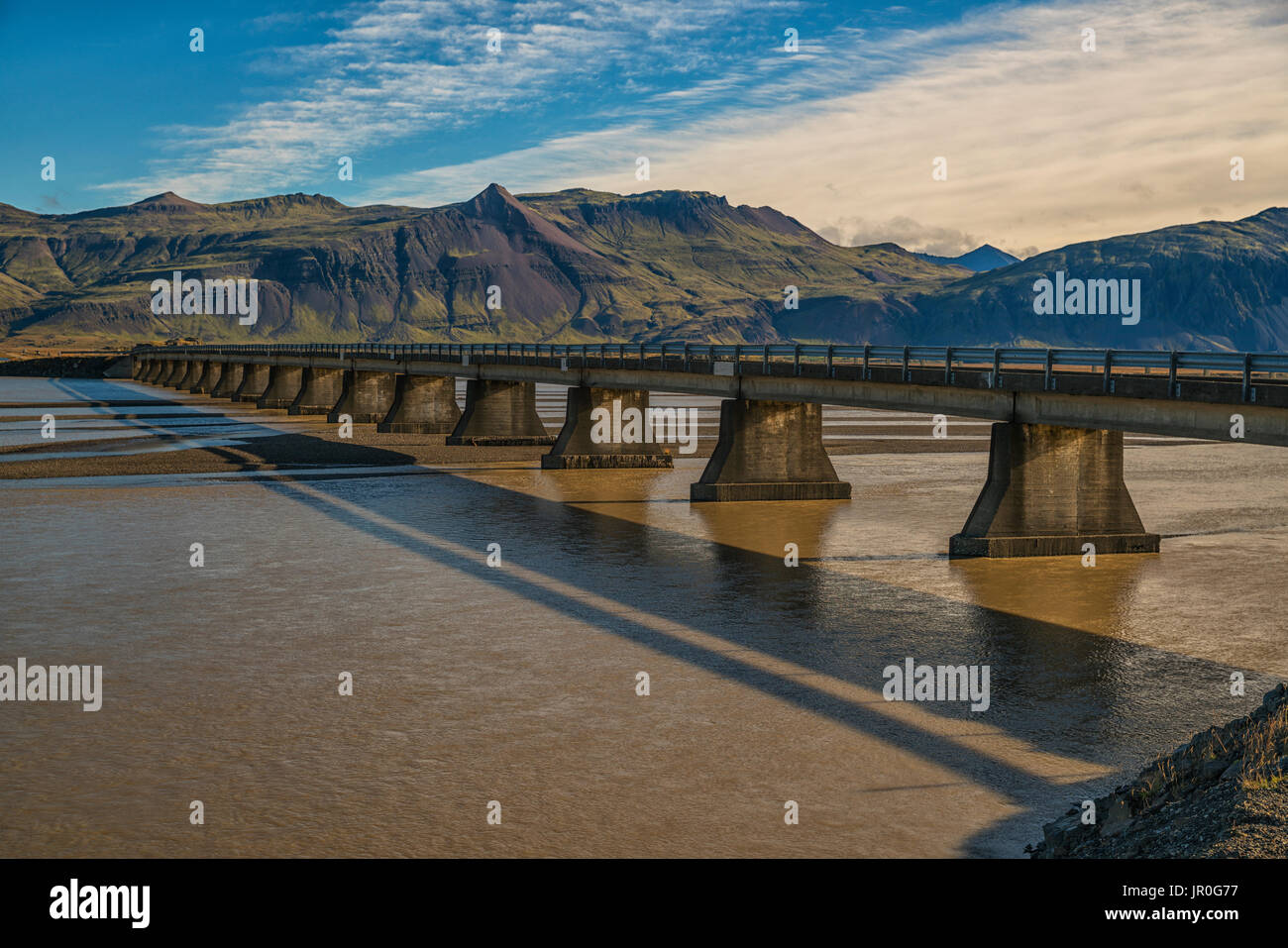 Bridge Over A Glacial River Along The South Coast Of Iceland; Iceland Stock Photo
