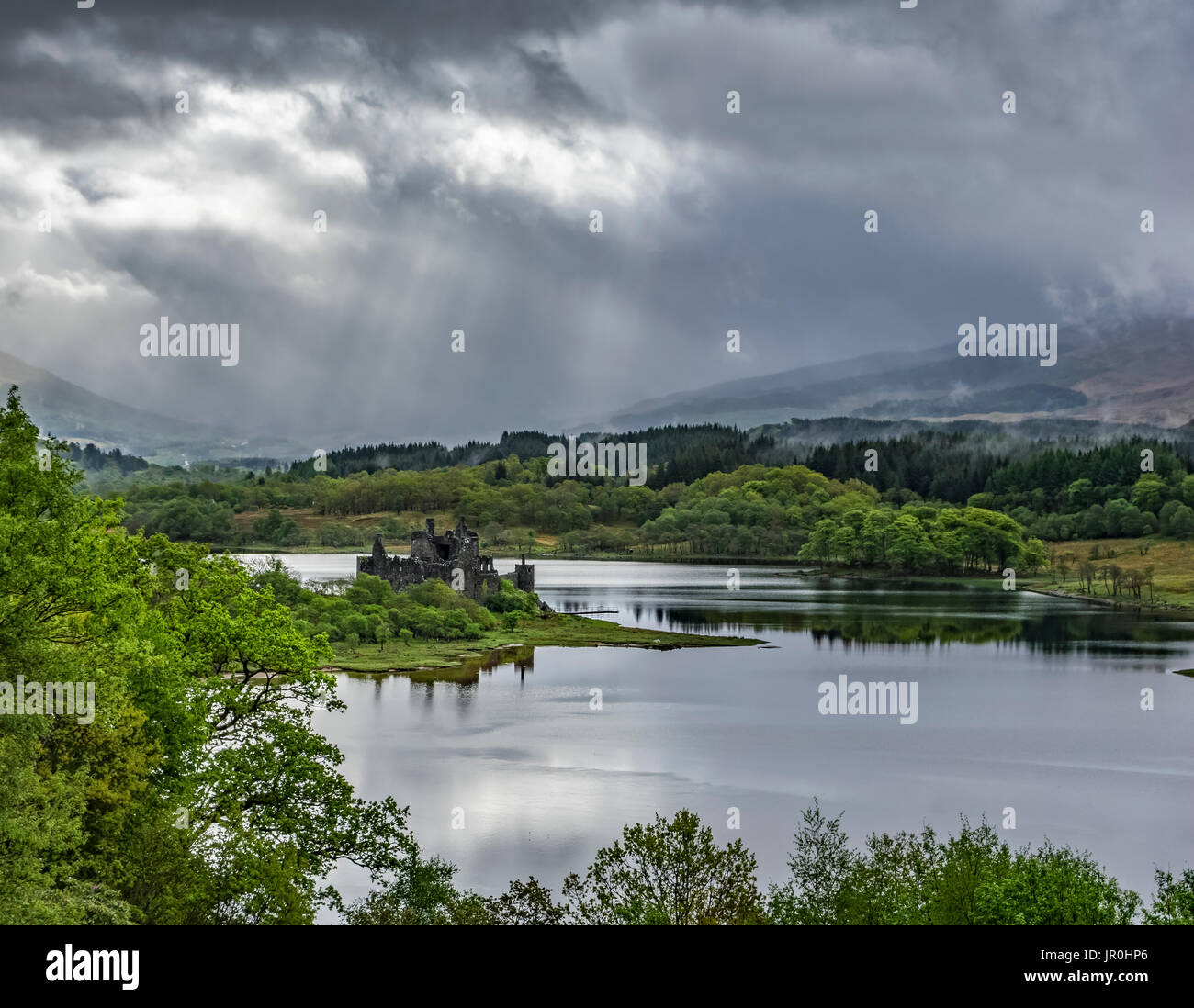 Sunlight On 15th Century Ruined Scottish Castle On The Banks Of Loch ...