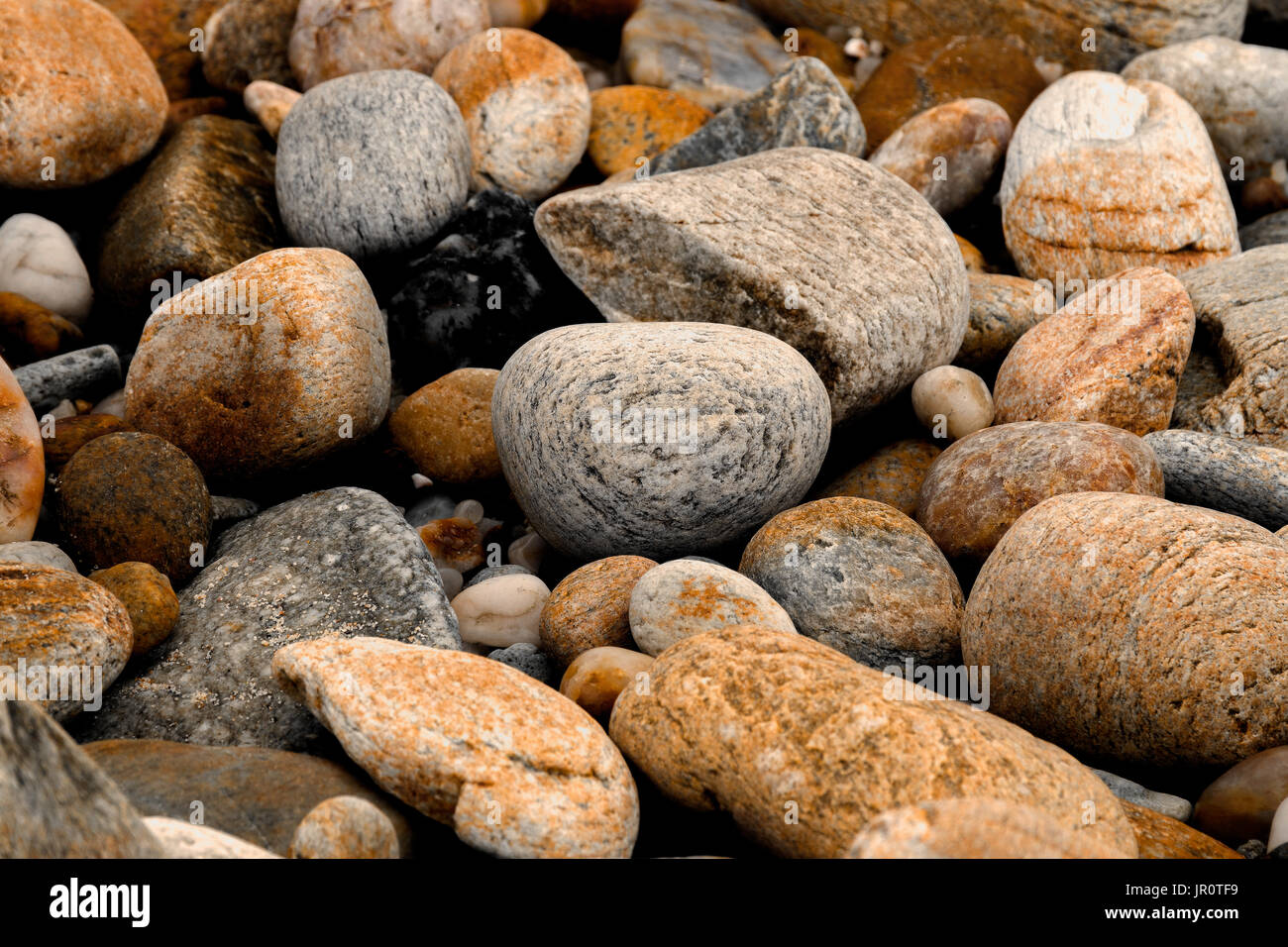 The stones on the beach near the sea after the water level drops Stock ...