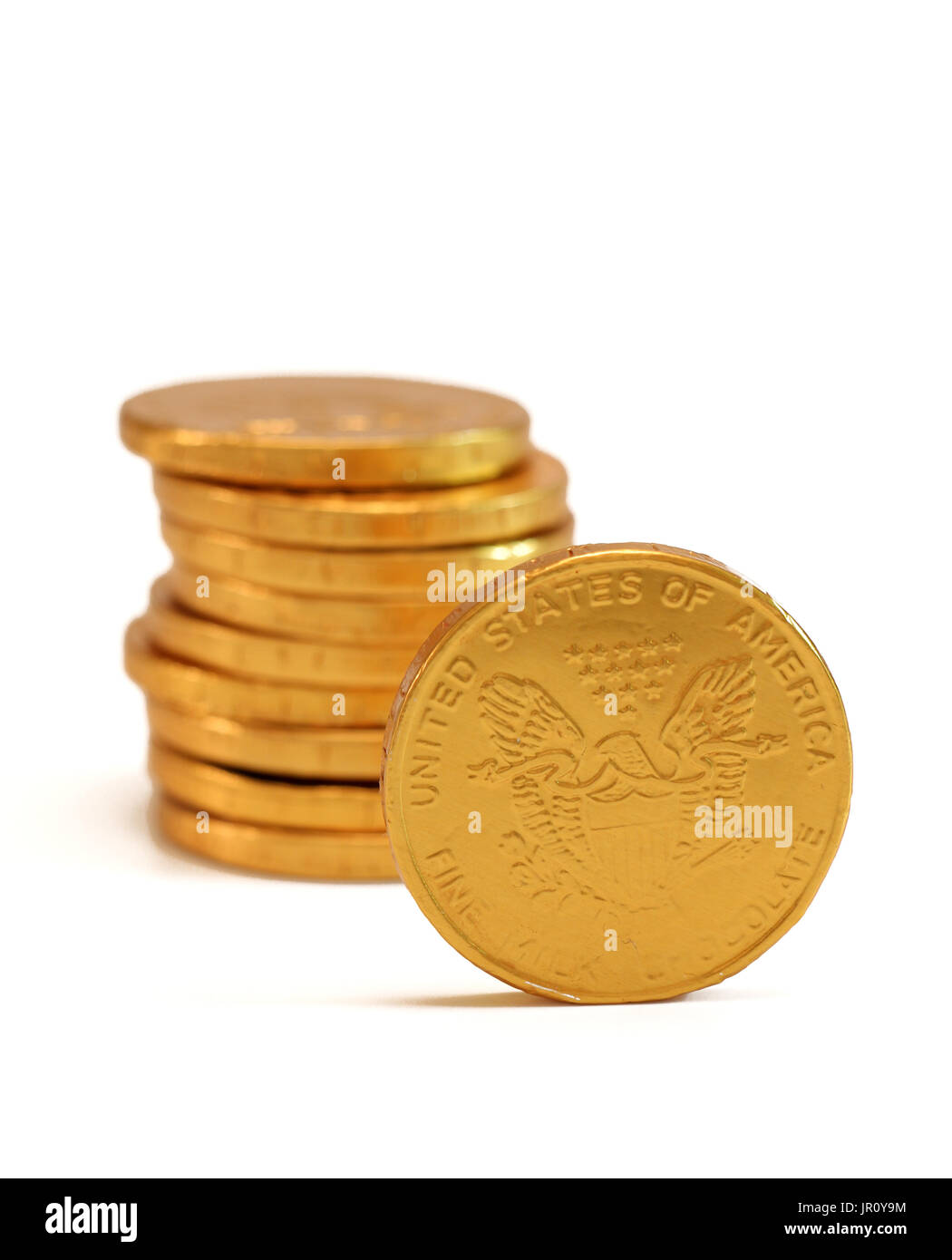 Chocolate gold coins isolated on a white background Stock Photo