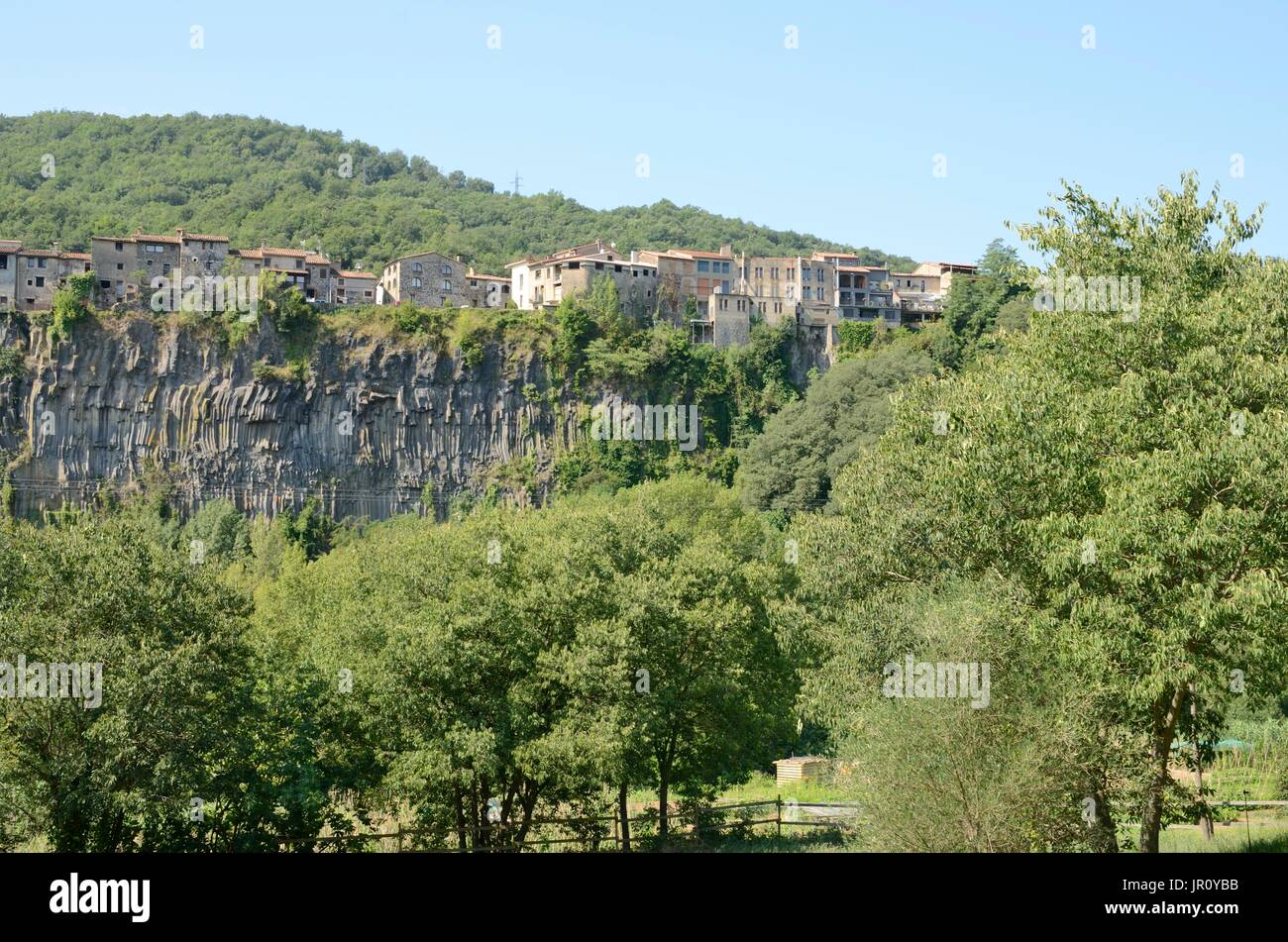 Houses of the small town Castellfollit de la Roca rised up on a basalt