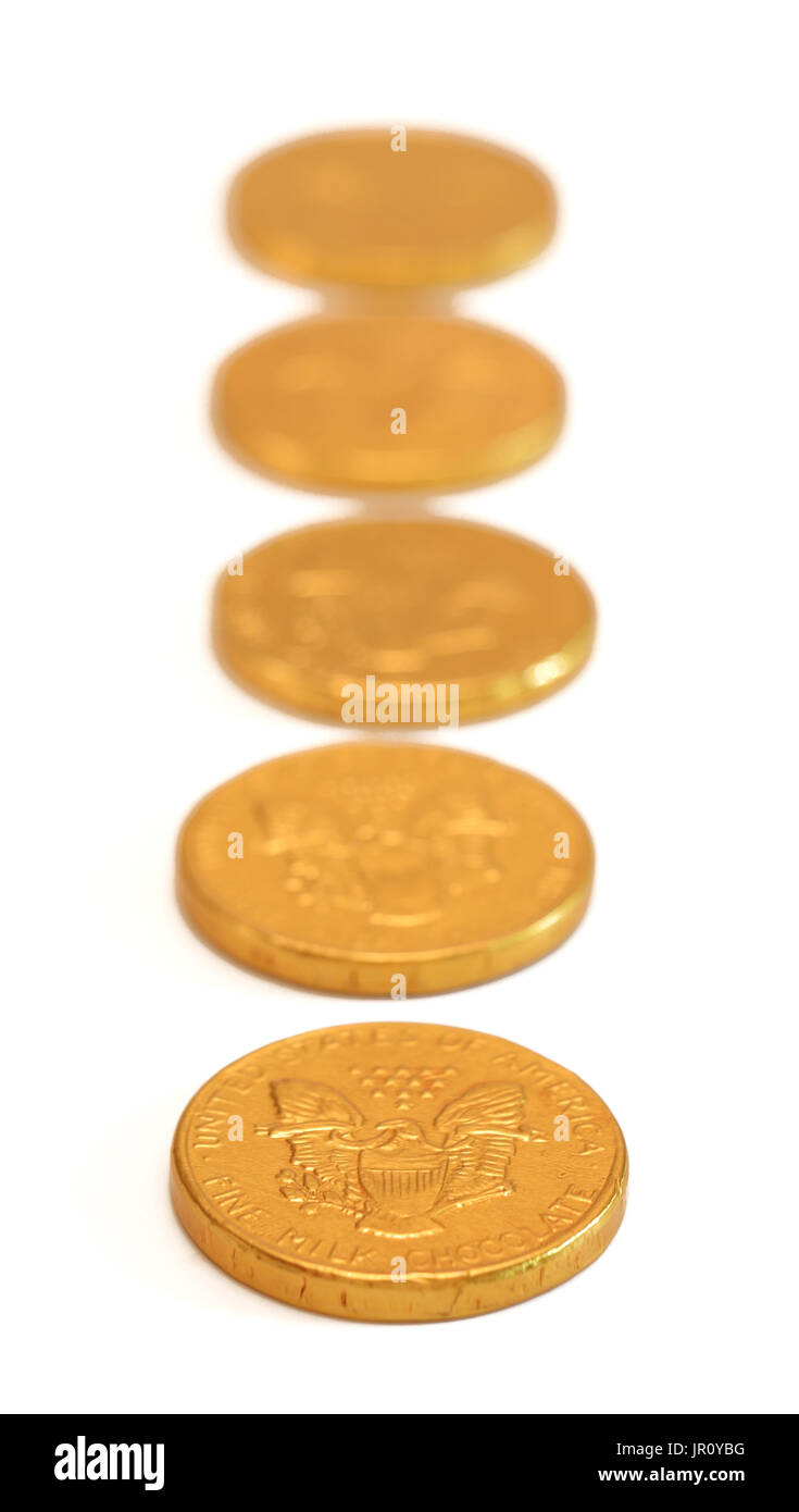 Chocolate gold coins isolated on a white background Stock Photo