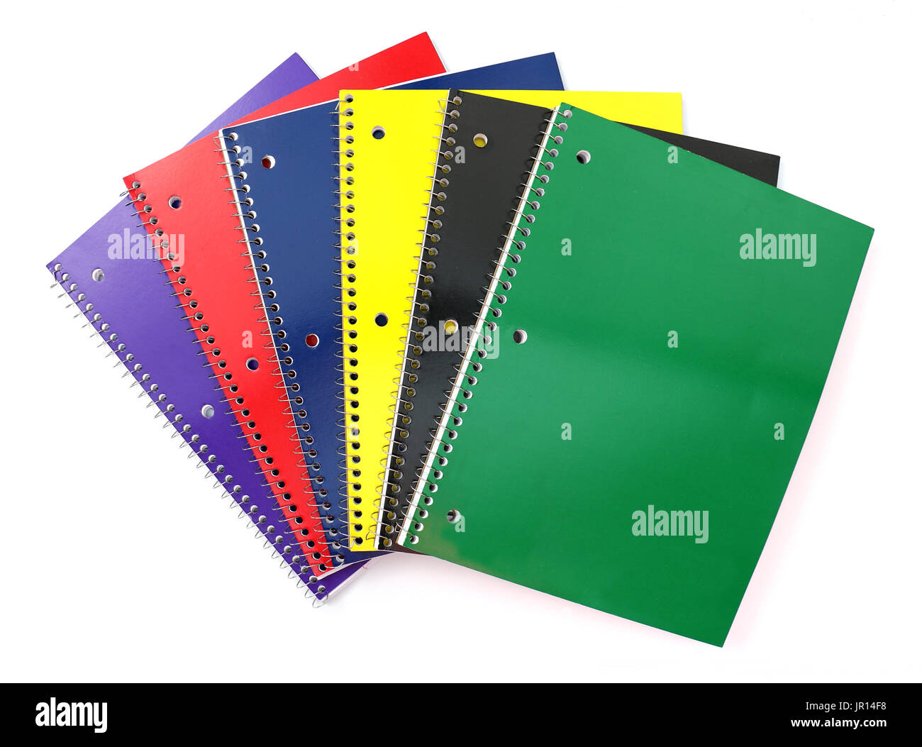 Spiral Notebooks in a stack on a white background Stock Photo