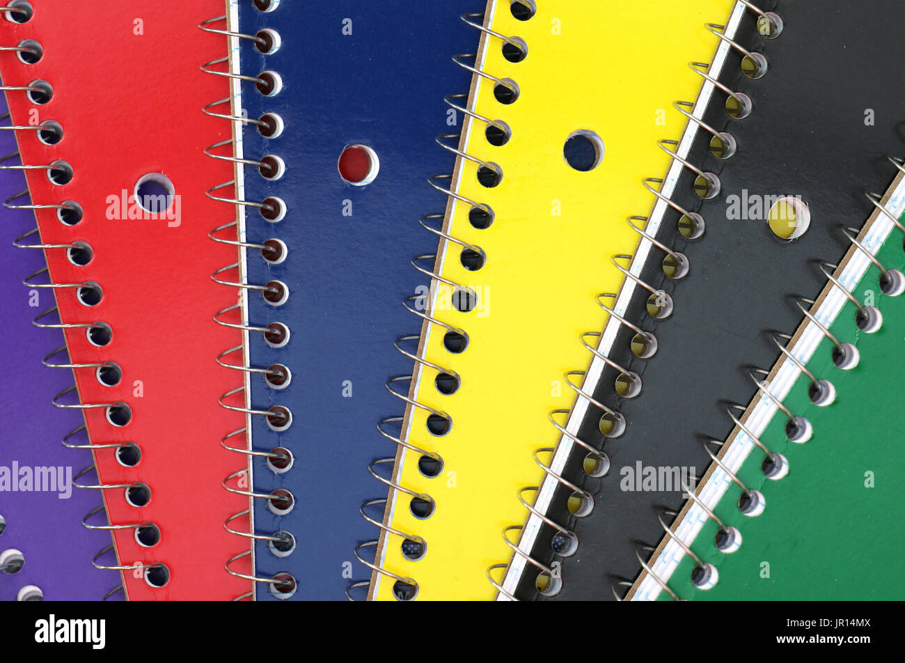 Spiral Notebooks in a stack on a white background Stock Photo