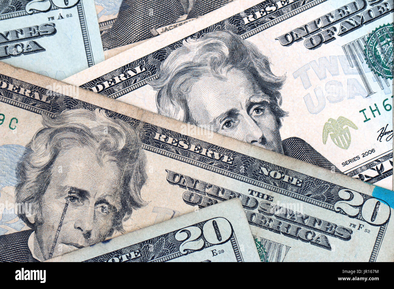 A background of crisp twenty dollar bills Stock Photo