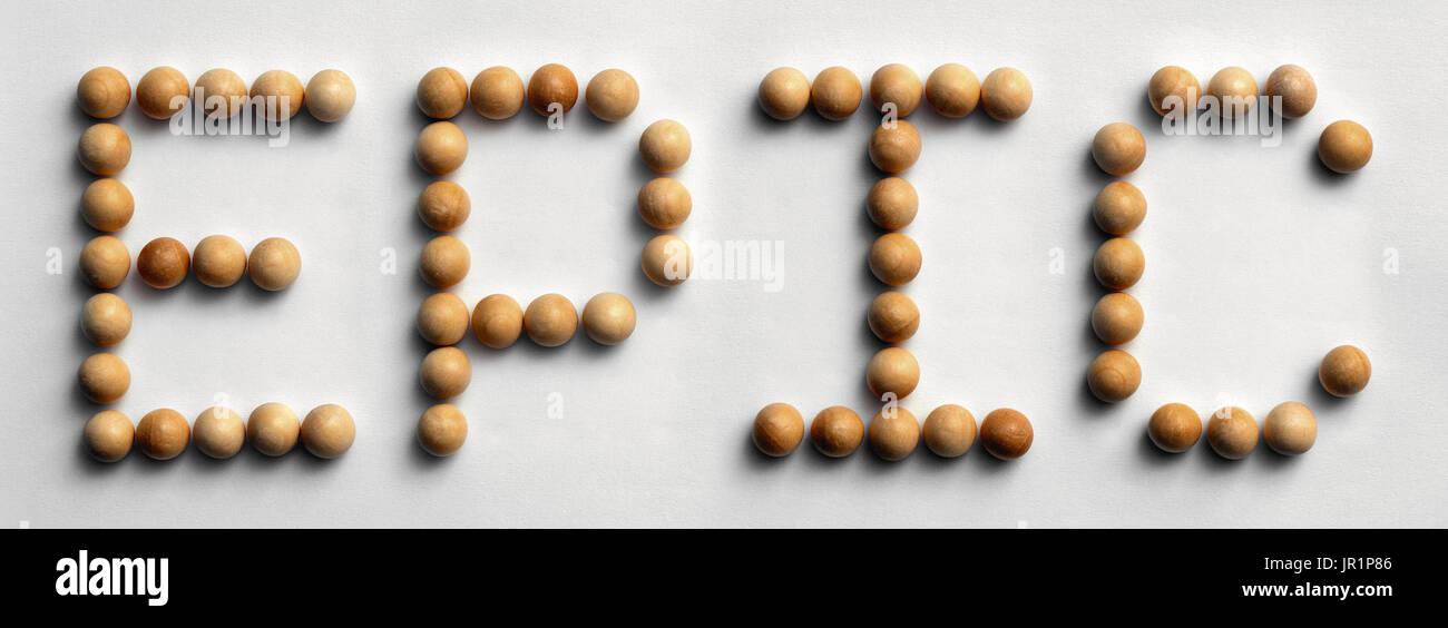 Photograph of the word 'Epic' spelled out with wood push pins Stock Photo