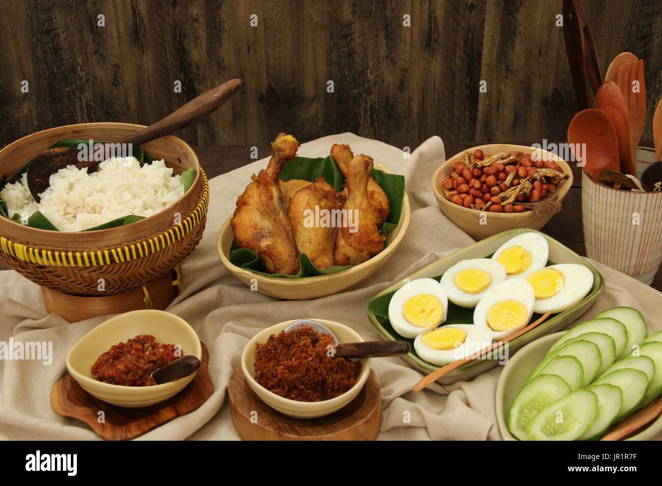 Nasi Lemak, Malaysian Savory Rice Dish with Fried Chicken, Egg, Peanuts