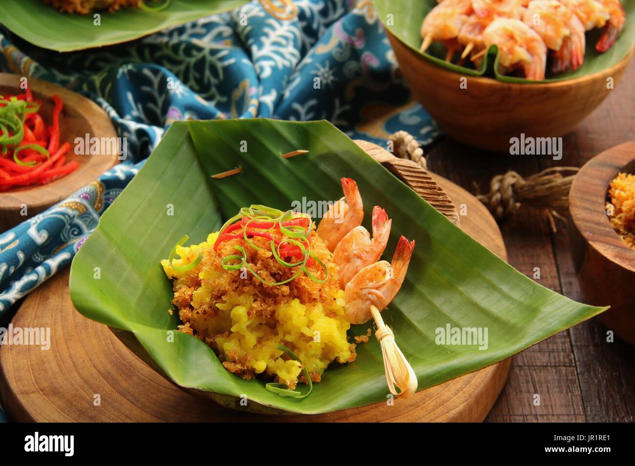 Ketan Serundeng Udang. Turmeric Sticky Rice with Roasted Coconut and