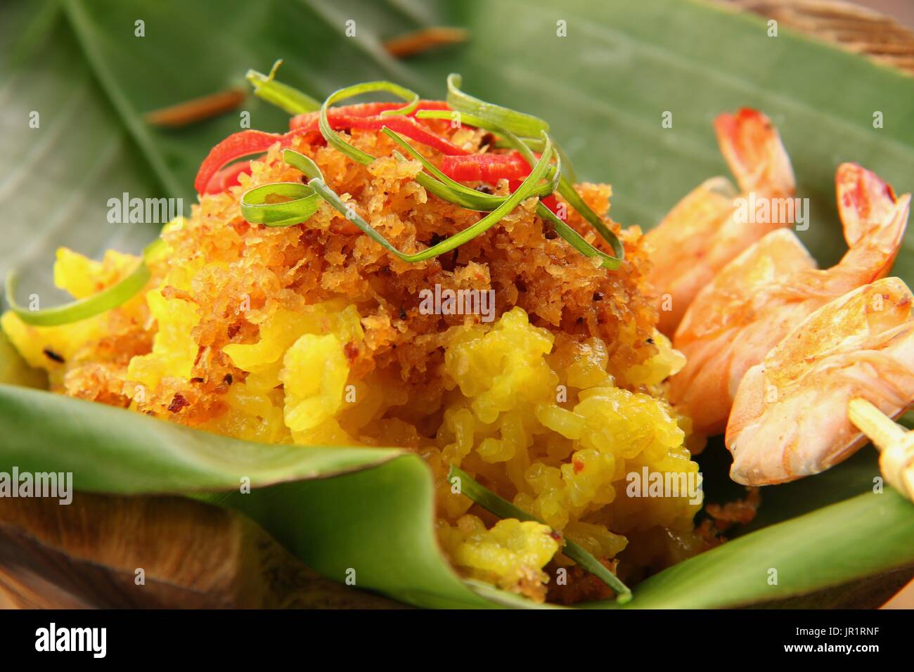 Ketan Serundeng Udang. Turmeric Sticky Rice with Roasted Coconut and