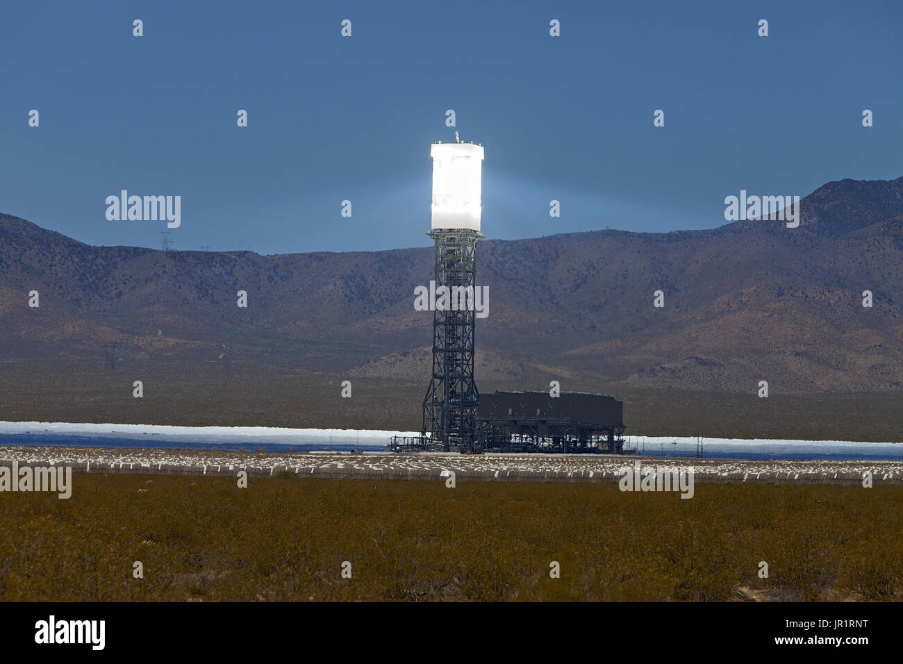 Boiler tower(s) at Ivanpah Solar Electric Generating System. A concentrated solar thermal plant in the Mojave Desert, California. Stock Photo