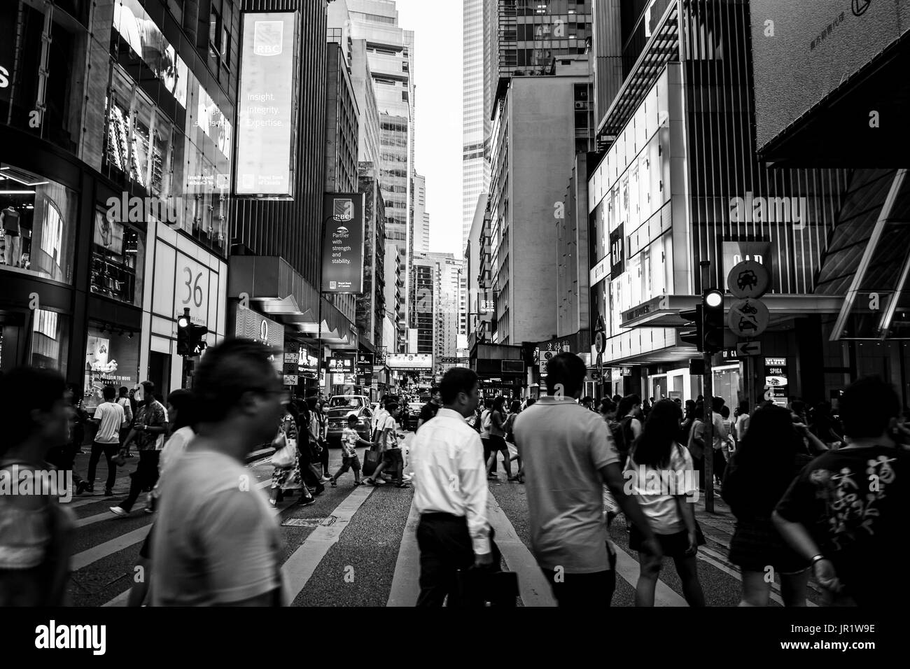 People walking on Queen's Road, Central after work Stock Photo