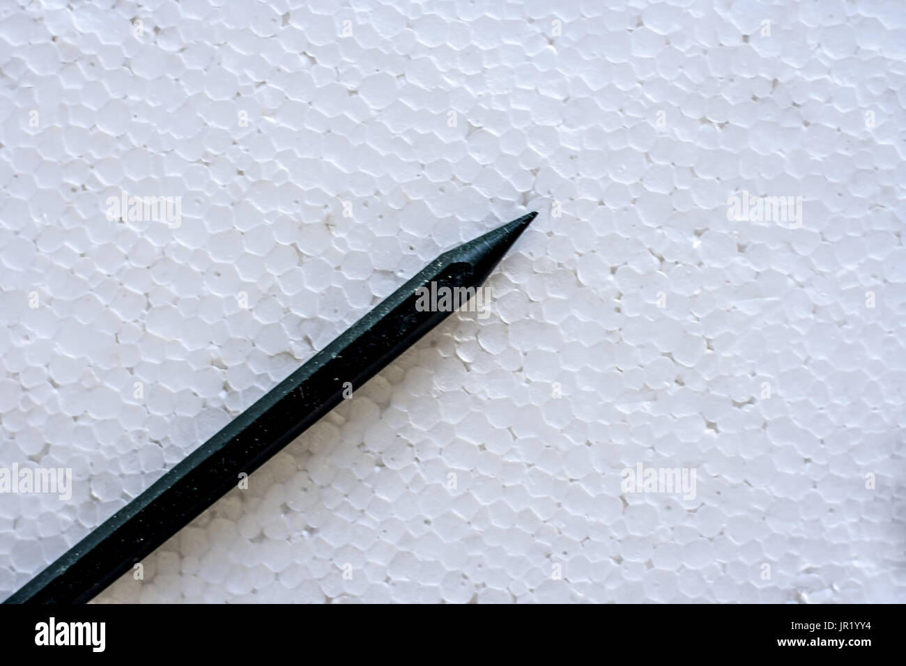 Dark Green colored crayon isolated on white. Stock Photo