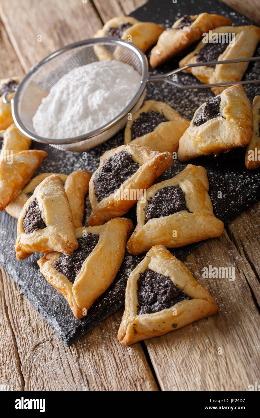 Hamentashen triangular cookies with poppy seed for Purim holiday Stock