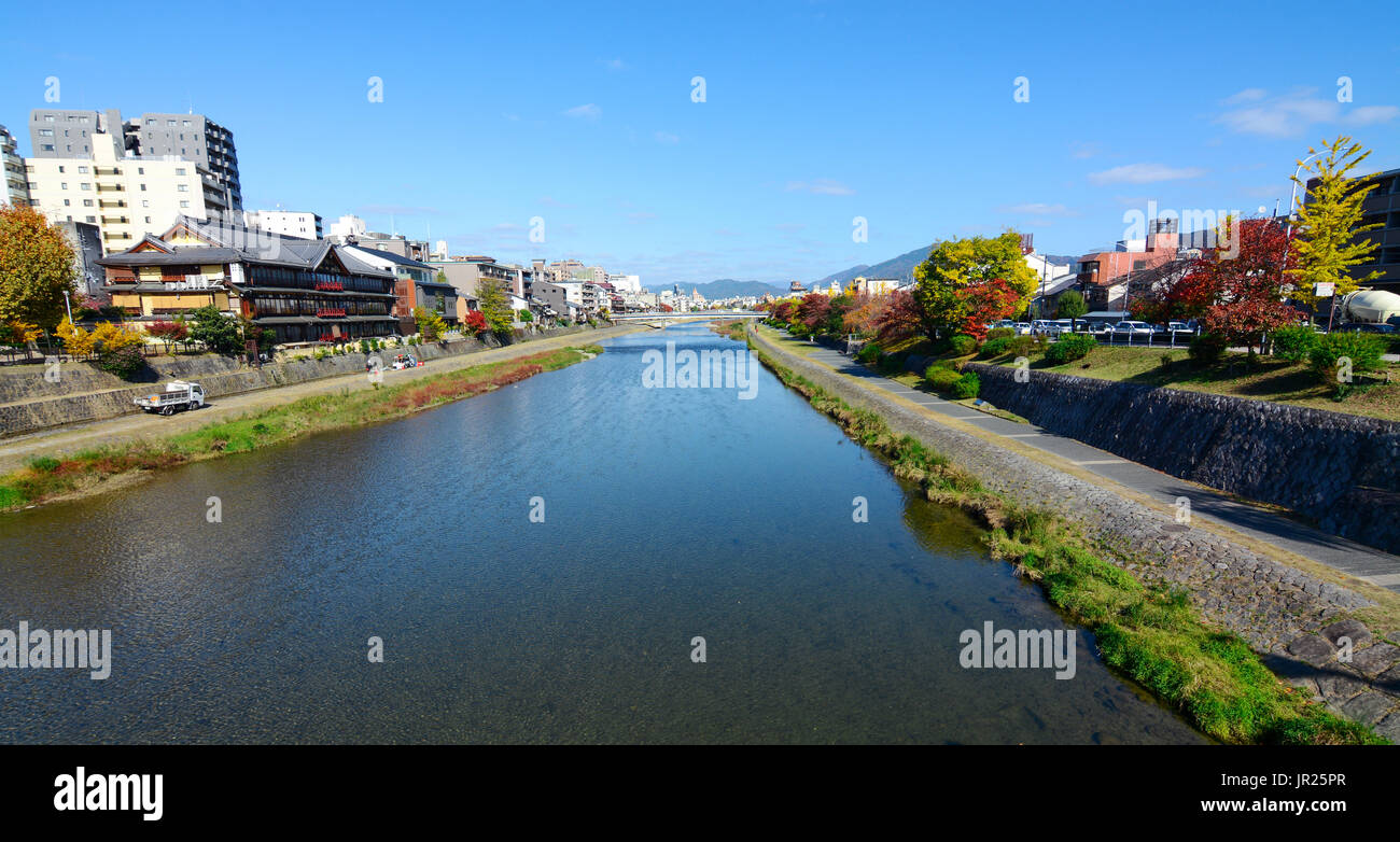 Autumn colors along the beautiful Kamo River in the city center of Kyoto, Japan Stock Photo