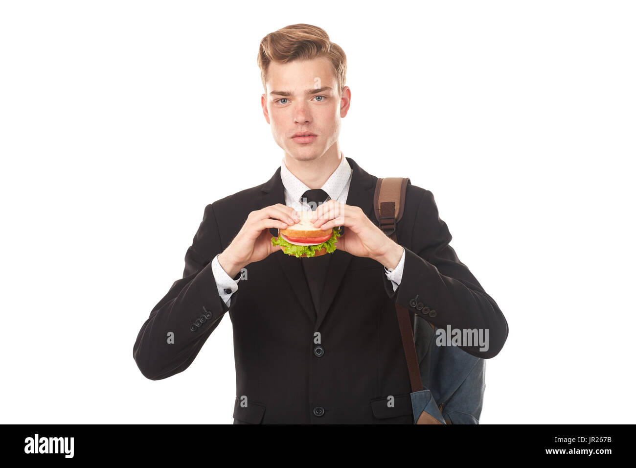 College student eating sandwich Stock Photo