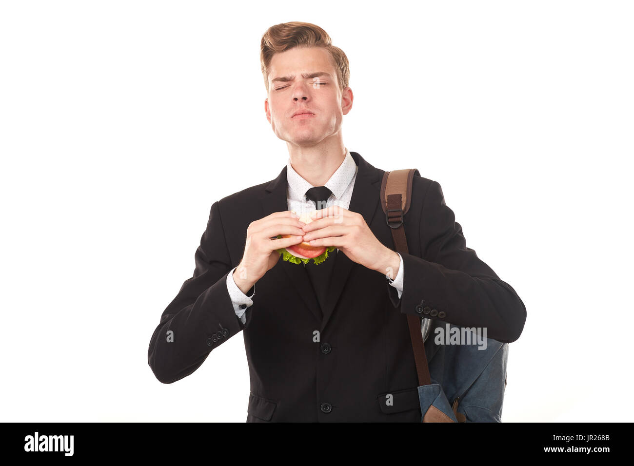 College student eating sandwich Stock Photo
