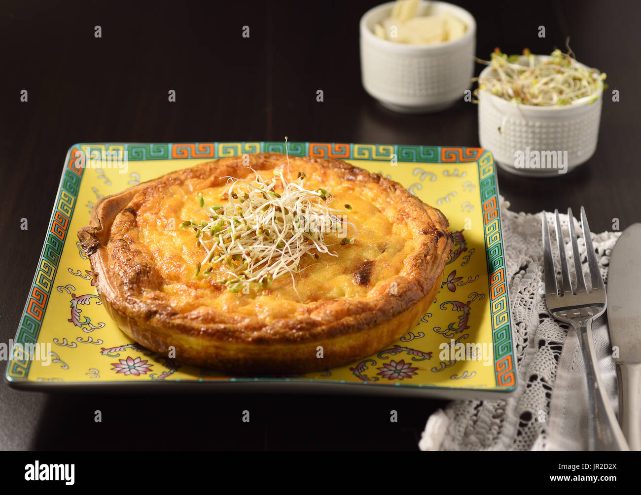 Vegetarian cheese quiche ready for meal with sides Stock Photo Alamy