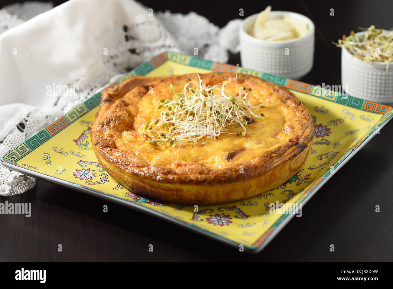 Vegetarian cheese quiche ready for meal with sides Stock Photo Alamy