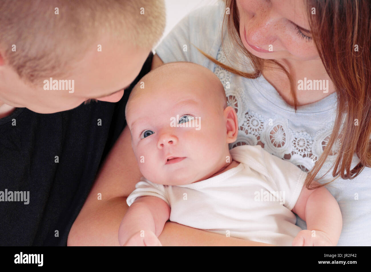 Family Portrait Of Little Cute Baby And Parents Happy Family Concept Concept Of Baby Care Maternal Love And Parental Love Stock Photo Alamy Family Portrait Of Little Cute Baby And Parents Happy Family Concept Concept Of Baby Care Maternal Love And Parental Love Stock Photo Alamy