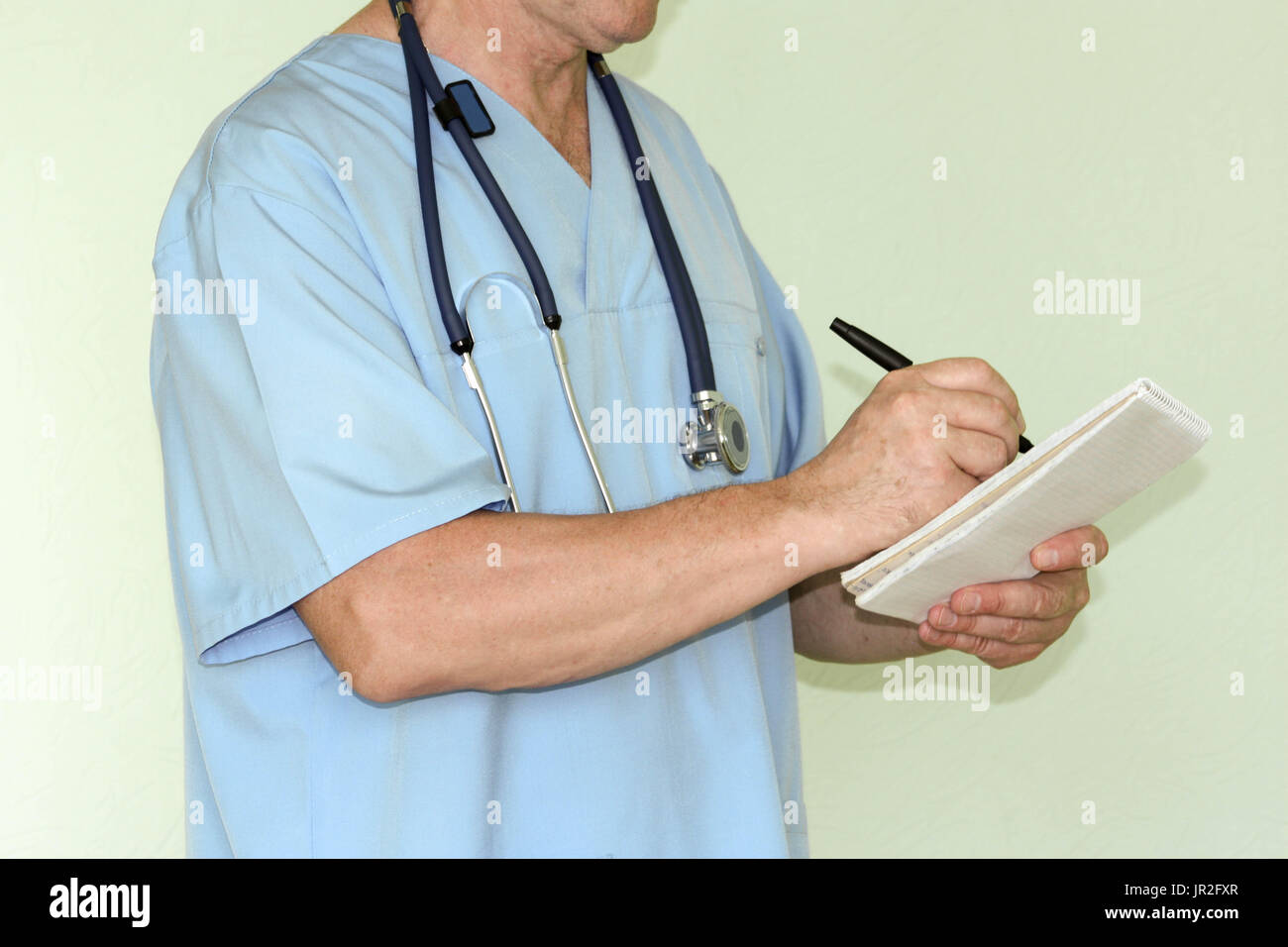Doctor concept medicine. Notepad writing in hands Stock Photo - Alamy
