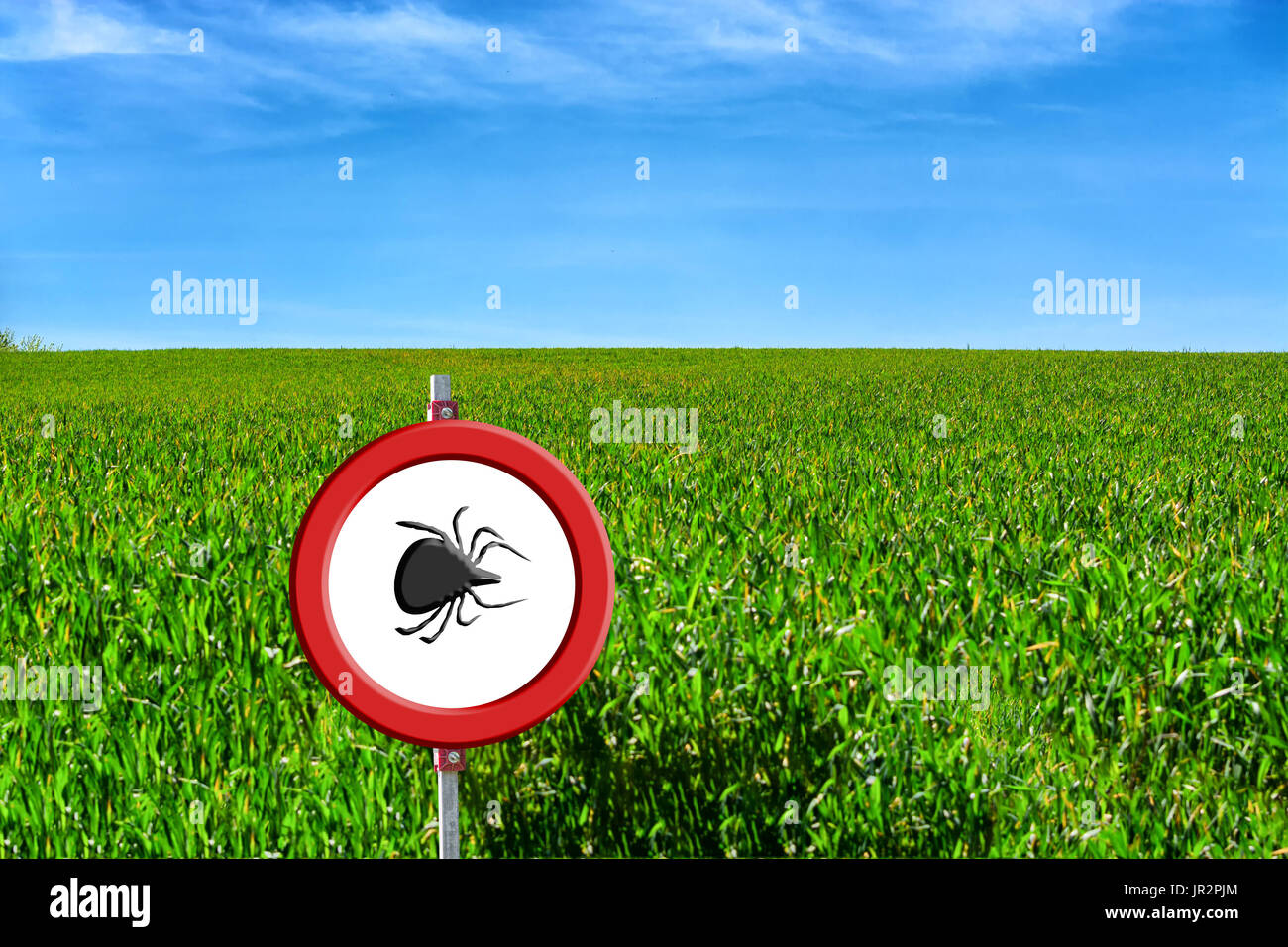 Borreliose and tick warning, round red warning sign with tick symbol in front of a green meadow. Stock Photo