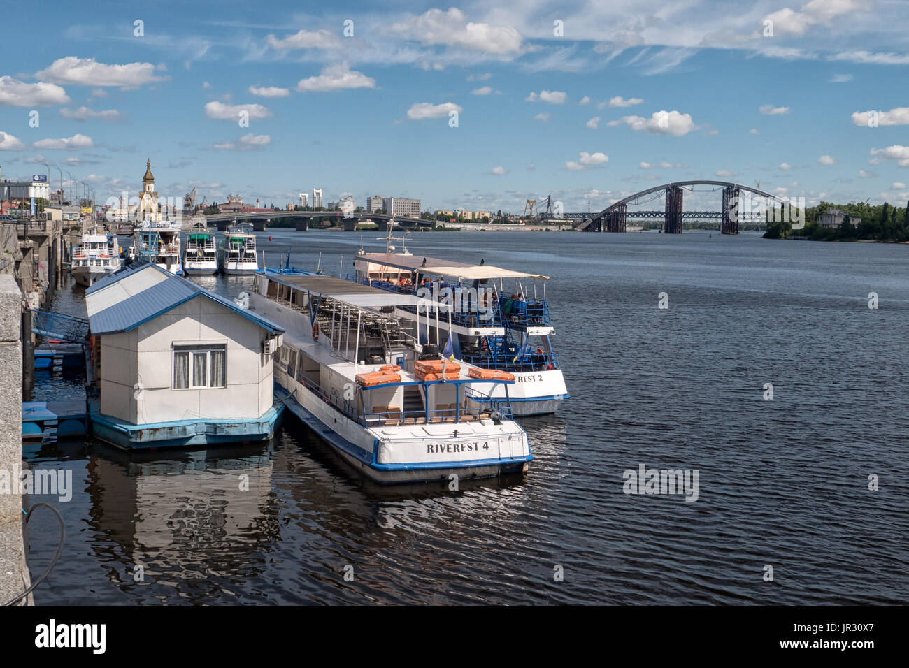 KYIV, UKRAINE - JUNE 12, 2016:  Tourist Boats at the Kiev River Port on the Dnieper (Dnipro) River in the Podil District Stock Photo