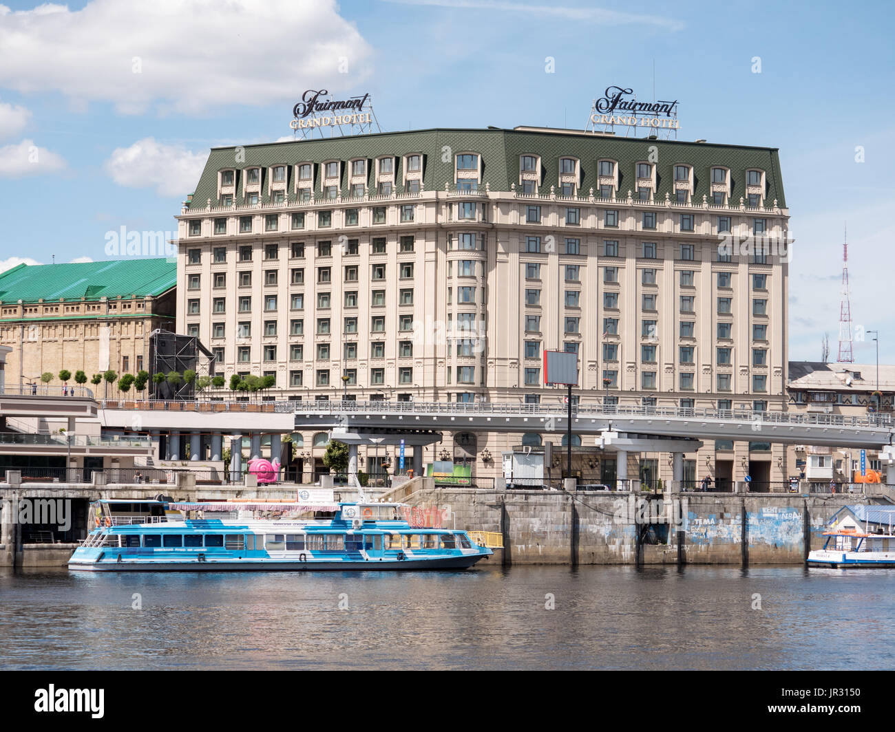KYIV, UKRAINE - JUNE 12, 2016:  Kiev River Port and the Fairmont Grand Hotel in the Podil District Stock Photo