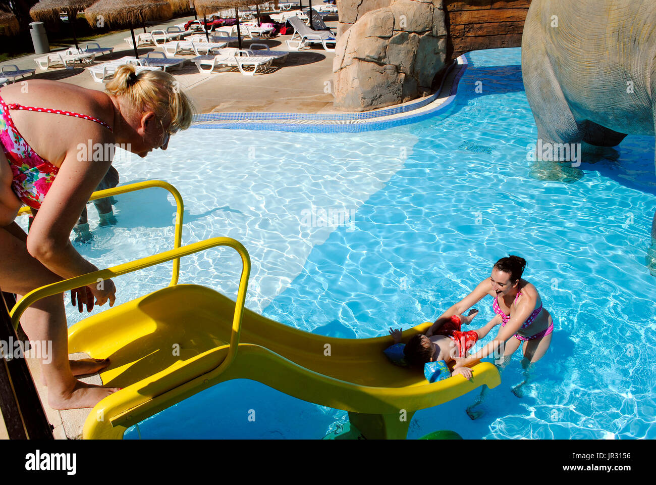 Mother and child enjoying the fun in a water park Stock Photo - Alamy