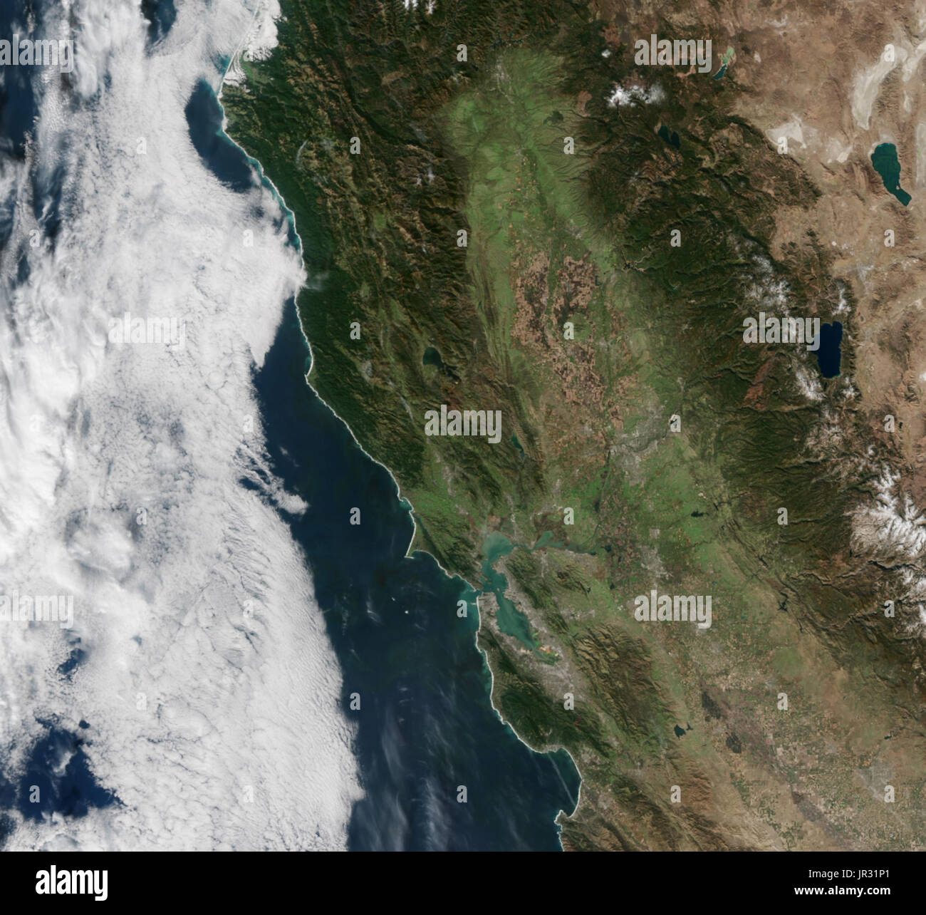 California coast on November 9, 2016, after years of drought, as seen by the Visible Infrared Imaging Radiometer Suite (VIIRS) on the Suomi NPP satellite. Compare with JG5744, taken in February, 2017, after a series of winter storms. Stock Photo
