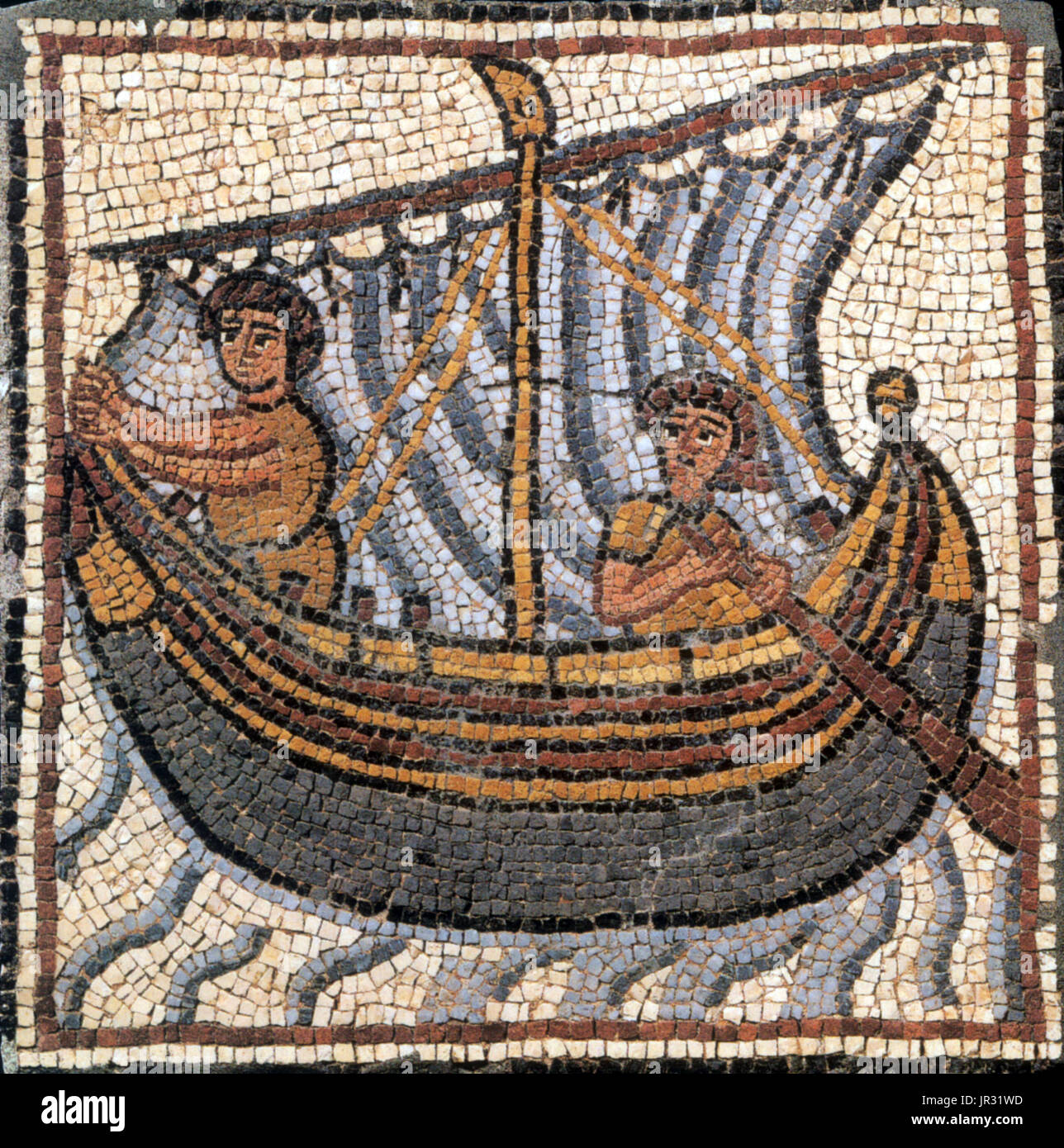 Byzantine Mosaic, Sailboat. Theodorias (modern Qasr Libya) was a Byzantine city in the Cyrenaica, founded in 539 by the emperor Justinian and named in honor of his wife, the Empress Theodora. The history of Qasr Libya goes back to the Greek period (4th century BC), when it was called Olbia. The complex contained two churches: the eastern church, discovered in 1957, and the western church, discovered in 1964. The mosaics were excavated from the nearby eastern church after they were discovered by Libyan laborers. The collection contains 50 panels, mostly of animals, gods, goddesses, nymphs, and  Stock Photo