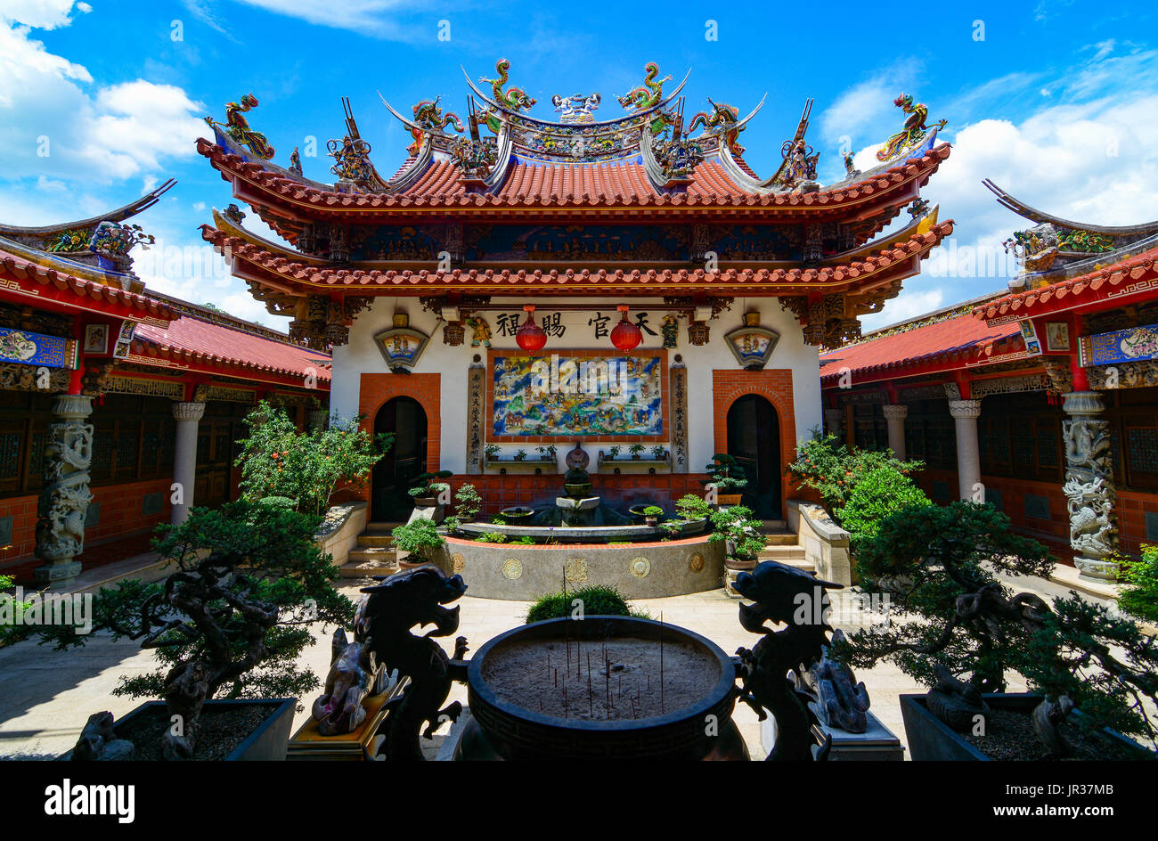 Beautiful Chinese architecture of Huwei Chifa Matsu Temple in Yunlin County, Taiwan. The text says: 'May the God of happiness give you a blissful life Stock Photo