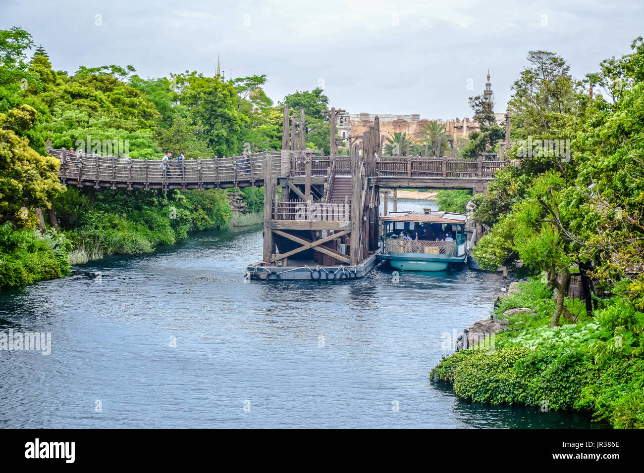 CHIBA JAPAN River Flows Through The Jungle With Old Wooden Bridge In chiba-japan-river-flows-through-the-jungle-with-old-wooden-bridge-in