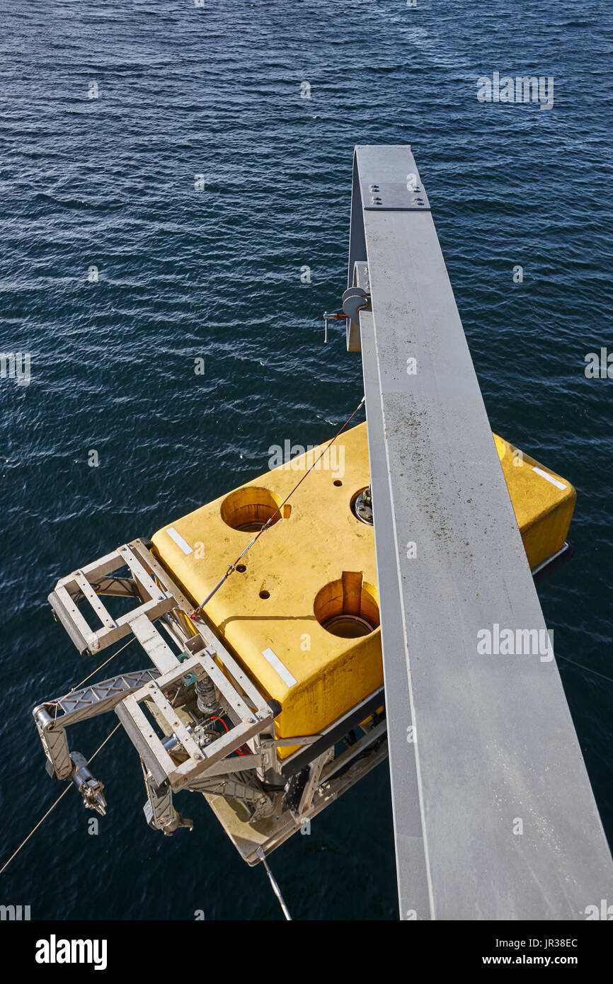 Scientific submarine robot with crane ready to be submerged. Research Stock Photo