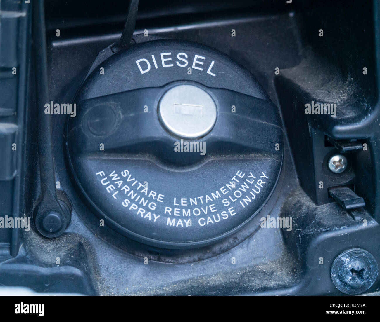 Close-up of a black plastic fuel filler cap of a diesel-powered car. Labeled 'Diesel'. Stock Photo