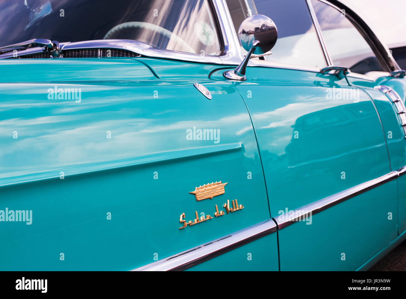 1956 Cadillac Sedan Deville side fender detail at an american car show. Essex. UK. Classic American Car Stock Photo