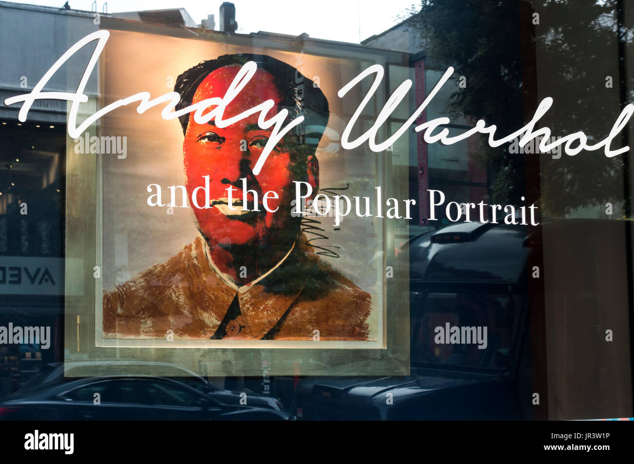 An Andy Warhol portrait of Mao displayed in the window of POP International Gallery in SoHo in New York City Stock Photo