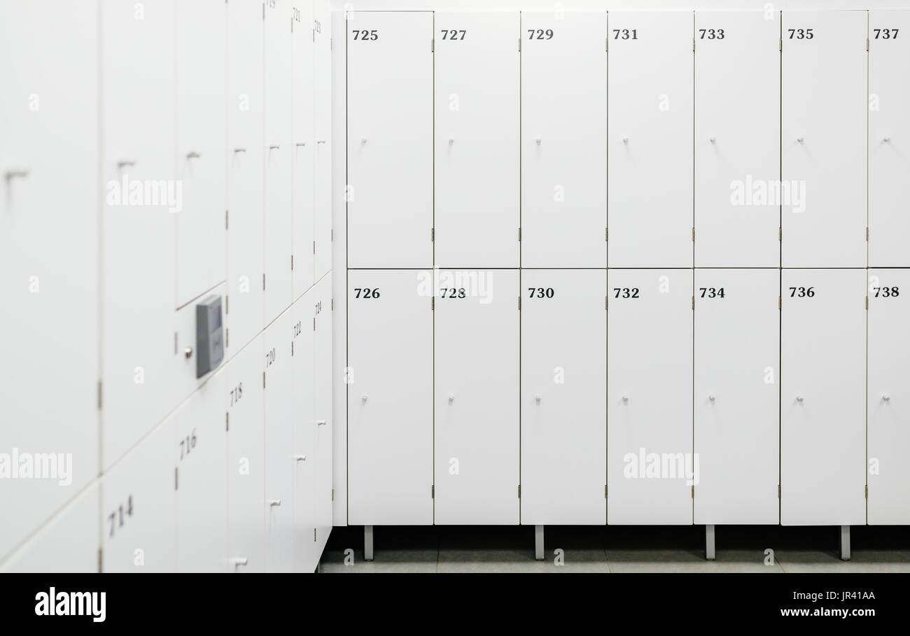 White change room lockers with electronic access control Stock Photo