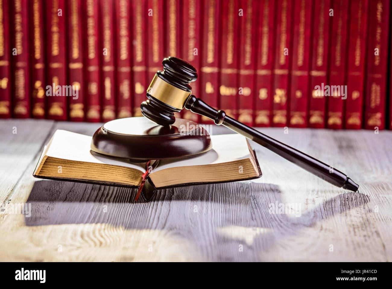 Gavel the symbol of law in court library with legal codes. Law concept